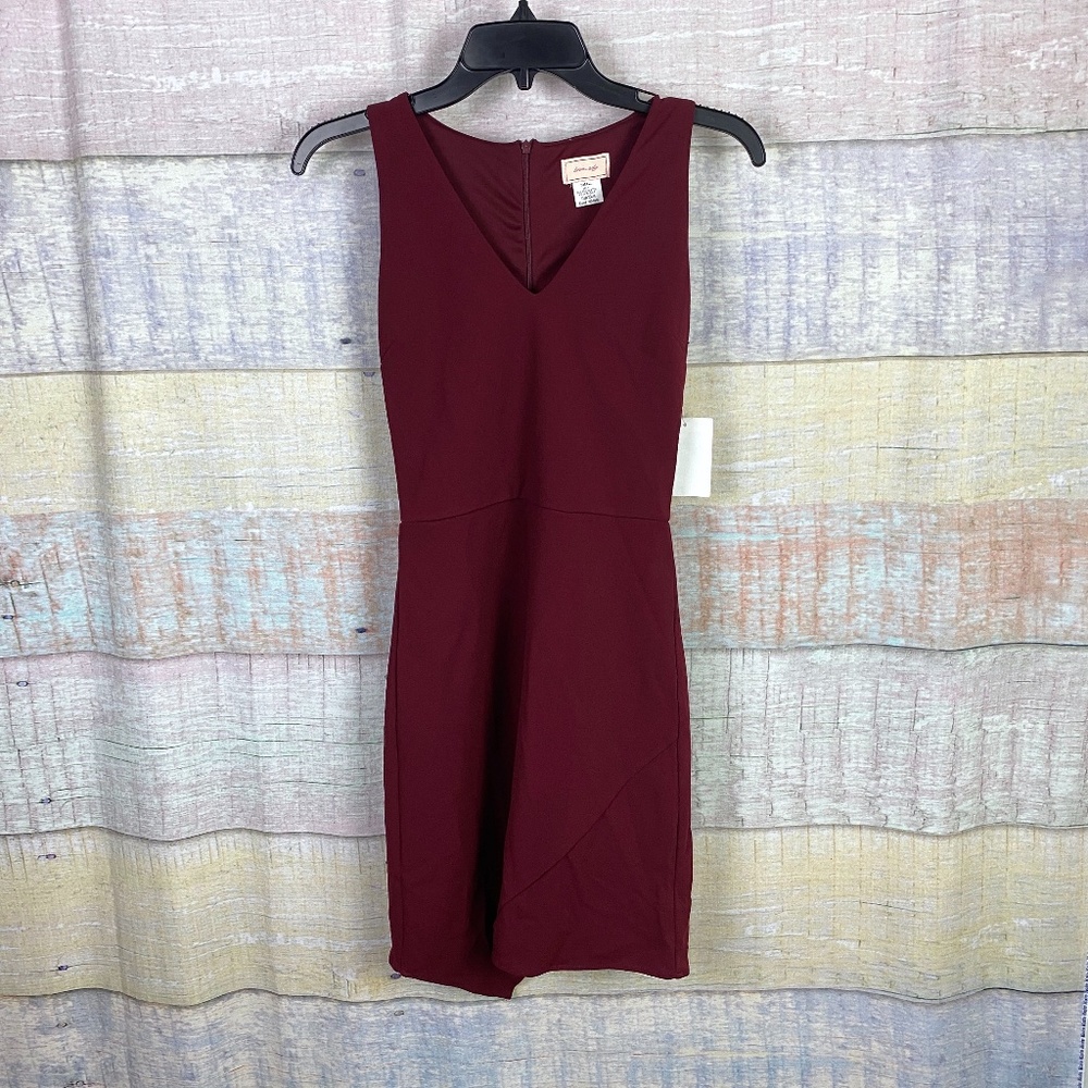 Love...ady V-Neck Sleeveless Asymertical Bottom Hem Mini Dress in Burgun…